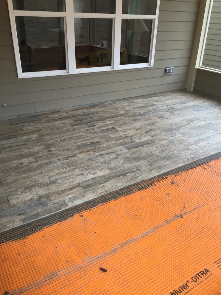 Tiled screened porch by Brinson Custom Tile - Photo 2