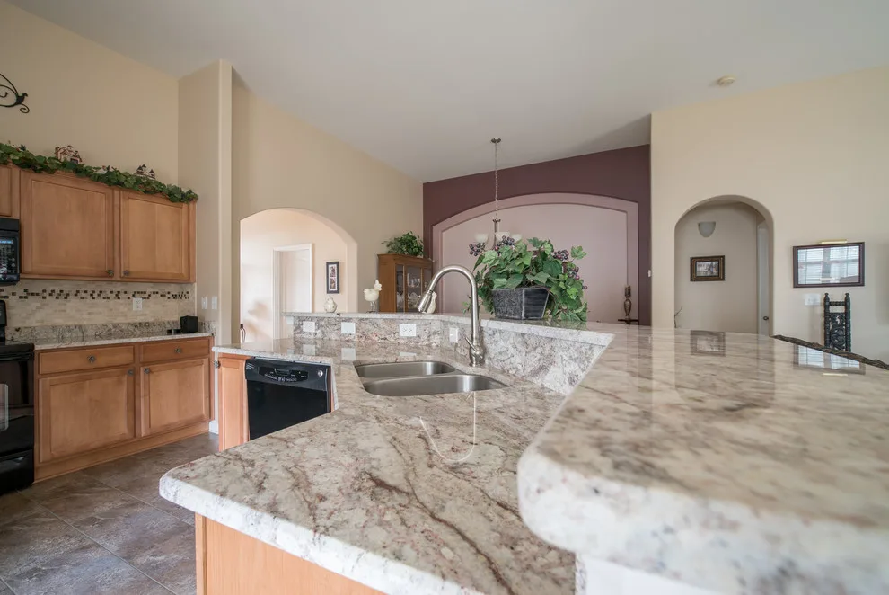 Bordeaux Granite Kitchen Countertops in Sienna by East Coast Granite & Tile - Photo 12