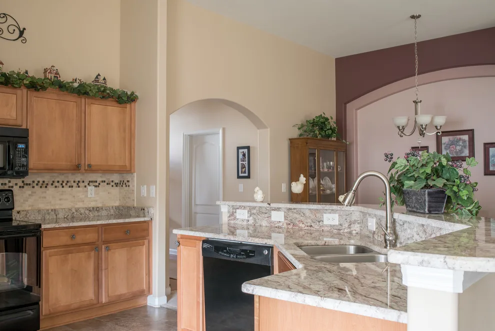 Bordeaux Granite Kitchen Countertops in Sienna by East Coast Granite & Tile - Photo 14