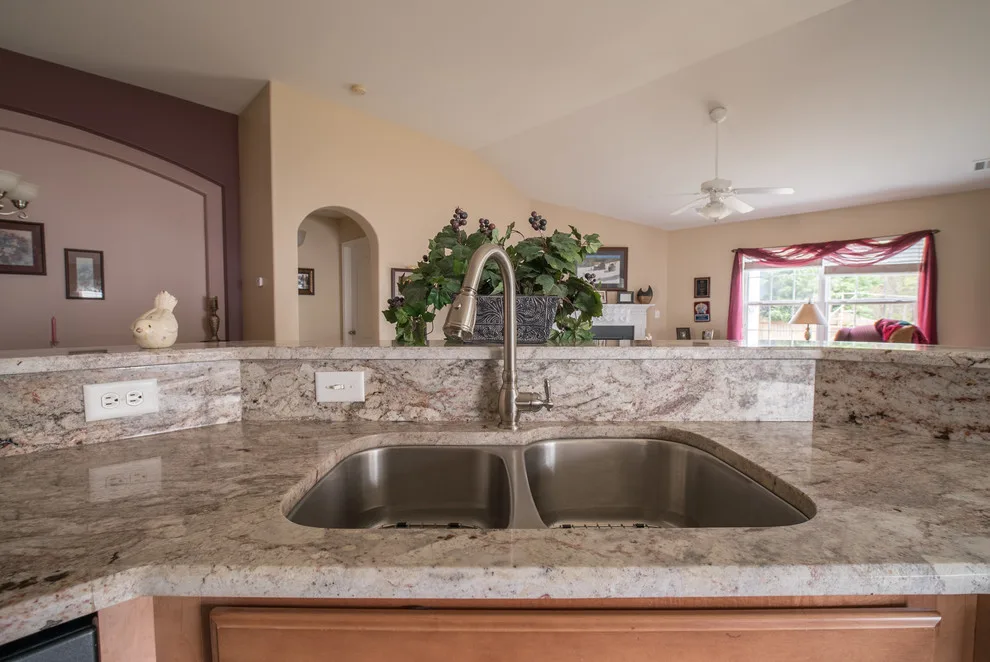 Bordeaux Granite Kitchen Countertops in Sienna by East Coast Granite & Tile - Photo 10