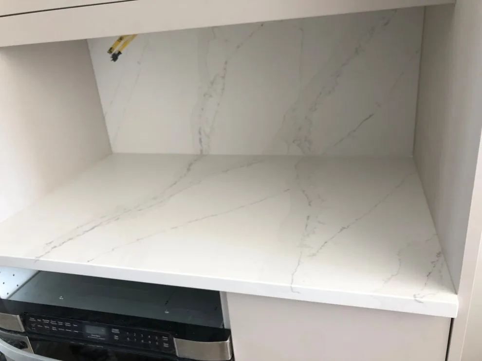 Eternal Gold Calacatta Silestone with Suede Finish by Gomez Granite Countertops - Photo 2