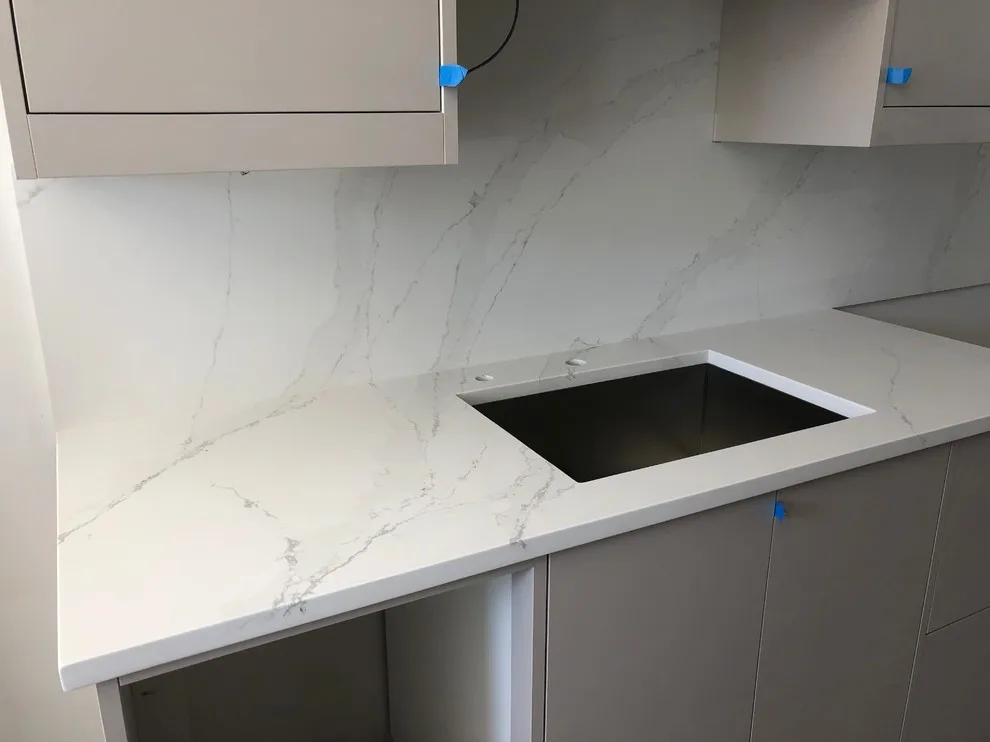 Eternal Gold Calacatta Silestone with Suede Finish by Gomez Granite Countertops - Photo 3