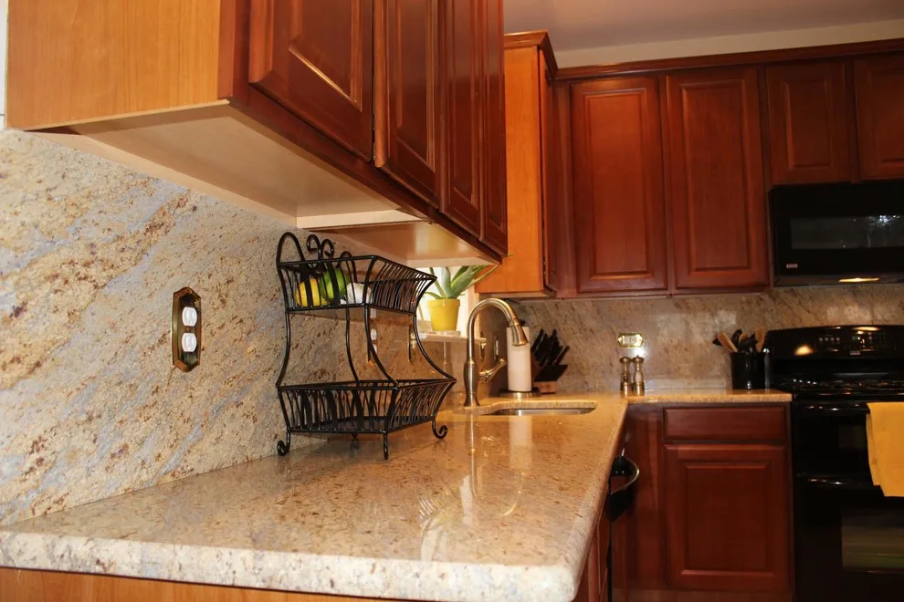 Classic Kitchen with L-Shaped Island and Granite Backsplash by Merlino Marble And Granite - Photo 3