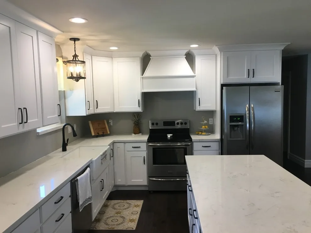 Quartz-Enhanced White Shaker Kitchen with Coordinating Fireplace by PSI Tops | Plastic Specialties Inc - Photo 6