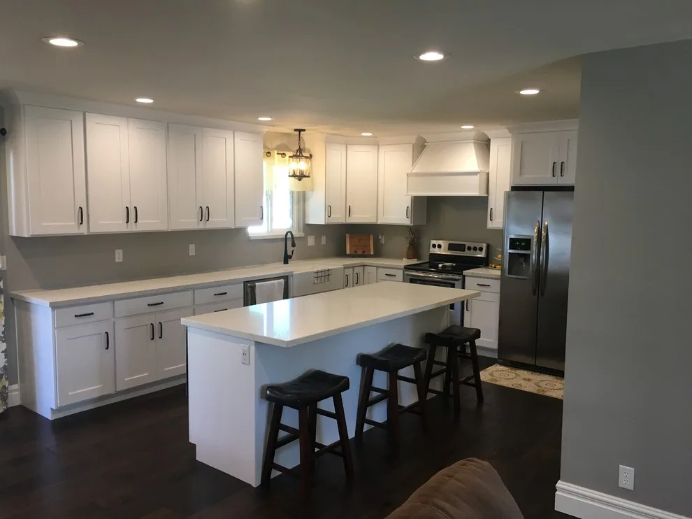 Quartz-Enhanced White Shaker Kitchen with Coordinating Fireplace by PSI Tops | Plastic Specialties Inc - Photo 5