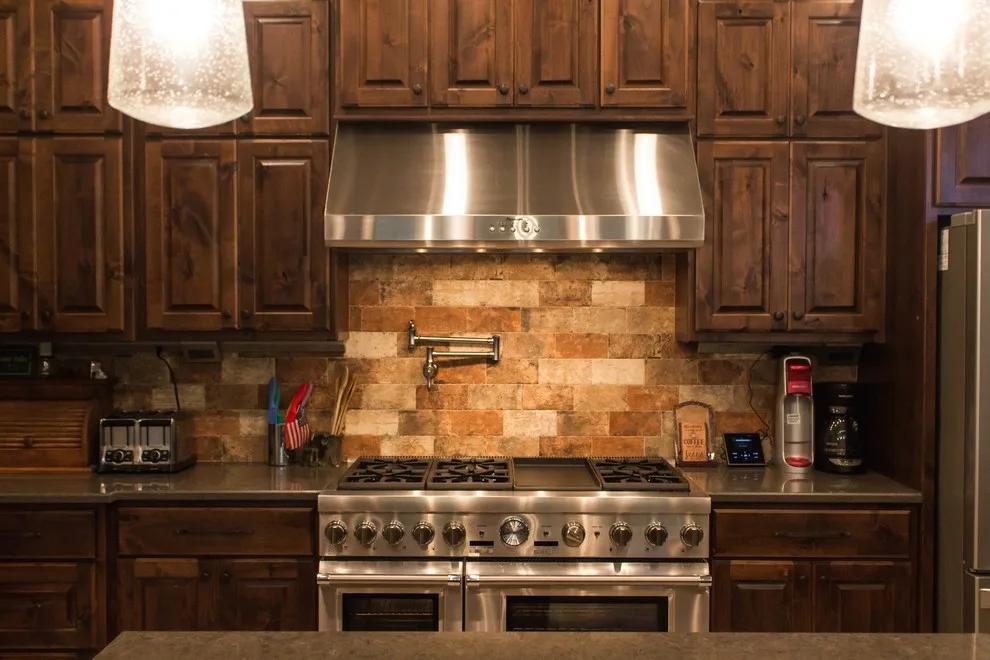 Rustic Lodge Style Kitchen in the Meadows Home by Robbins Construction - Photo 3