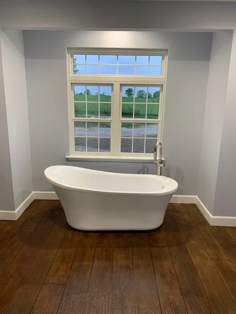 Concrete with a Rustic Wood Floor Appearance by Radlund Construction LLC - Photo 5