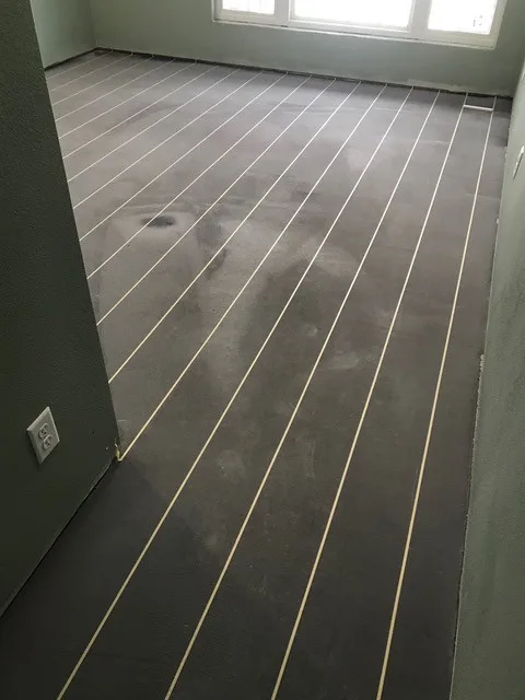 Concrete with a Rustic Wood Floor Appearance by Radlund Construction LLC - Photo 6