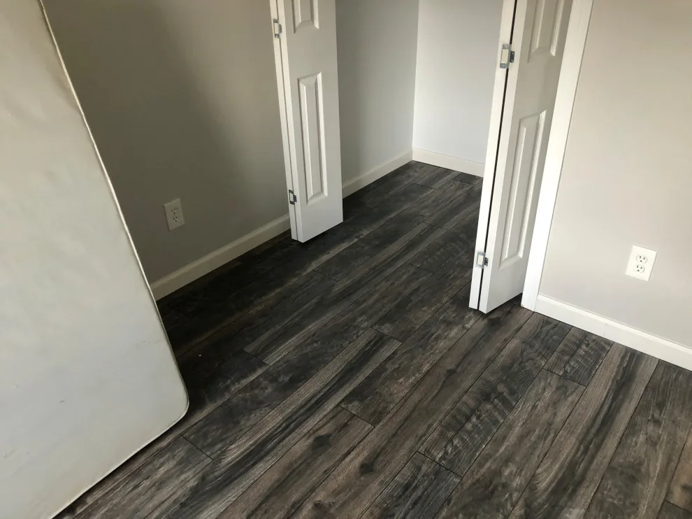 Seamless Laminate Flooring Installation by Phoenix Remodeling LLC - Photo 5