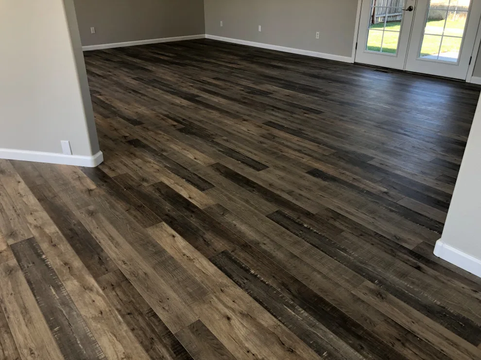Seamless Laminate Flooring Installation by Phoenix Remodeling LLC - Photo 3
