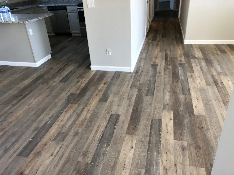Seamless Laminate Flooring Installation by Phoenix Remodeling LLC - Photo 6