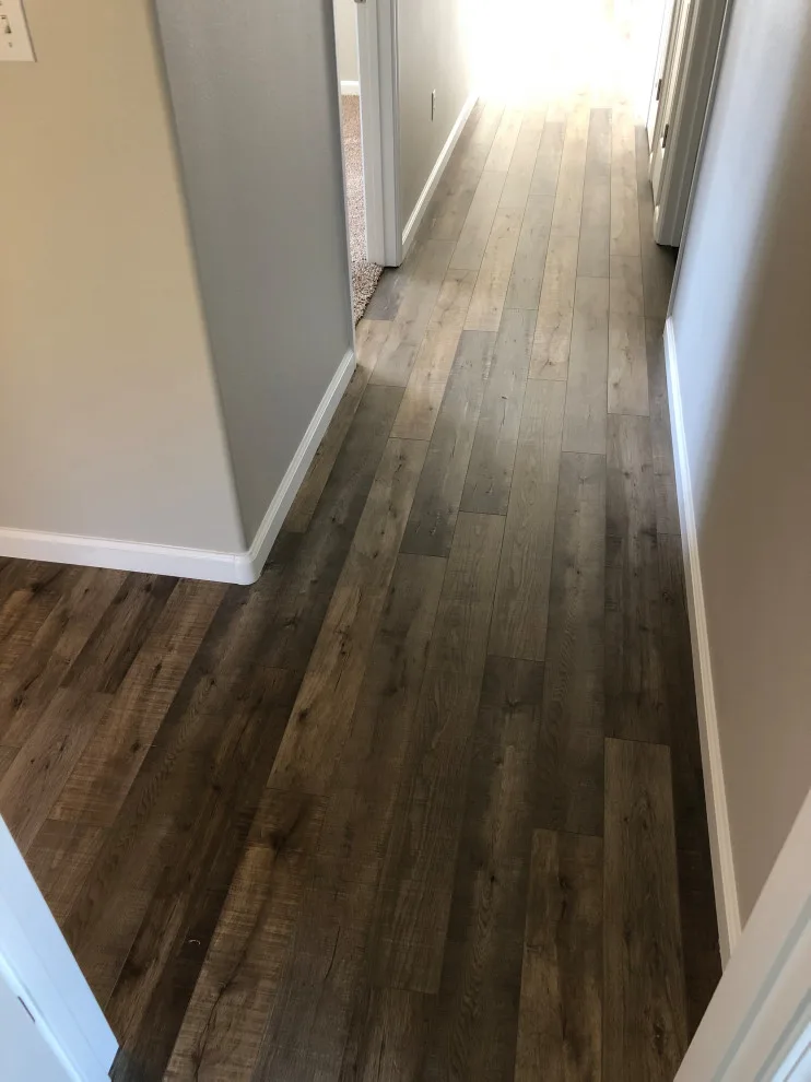 Seamless Laminate Flooring Installation by Phoenix Remodeling LLC - Photo 7