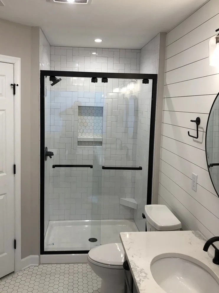 Bathroom with Subway Tile and Shiplap by Renata Renovations LLC - Photo 8