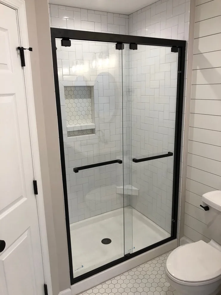 Bathroom with Subway Tile and Shiplap by Renata Renovations LLC - Photo 9