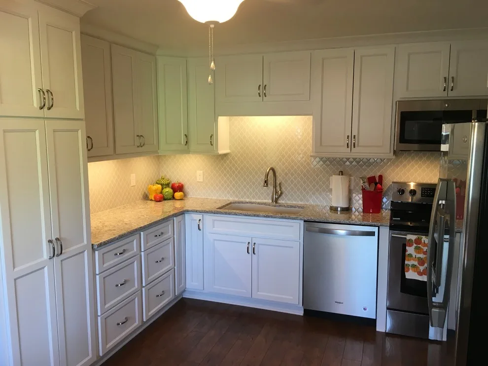 Sleek and Clean Kitchen Renovation by The Lifestyle Group Inc. - Photo 6
