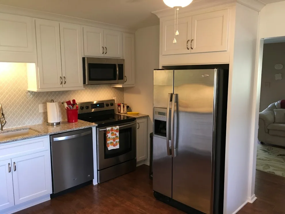 Sleek and Clean Kitchen Renovation by The Lifestyle Group Inc. - Photo 5