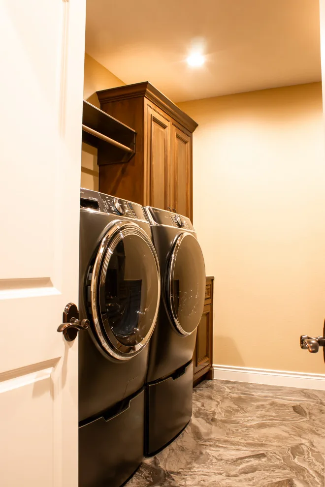 Slocum Custom Home - Entertainment Room & Laundry by Robbins Construction - Photo 3