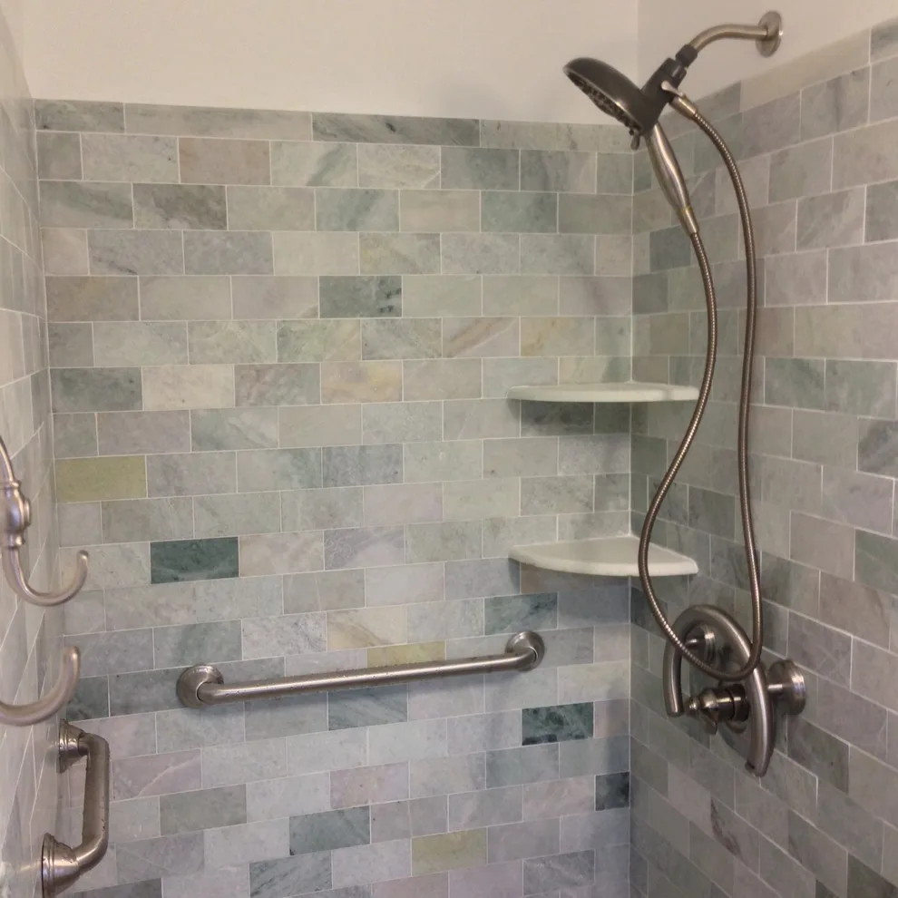 Marble-Tiled Compact Bathroom by Virginia Building And Remodeling - Photo 2