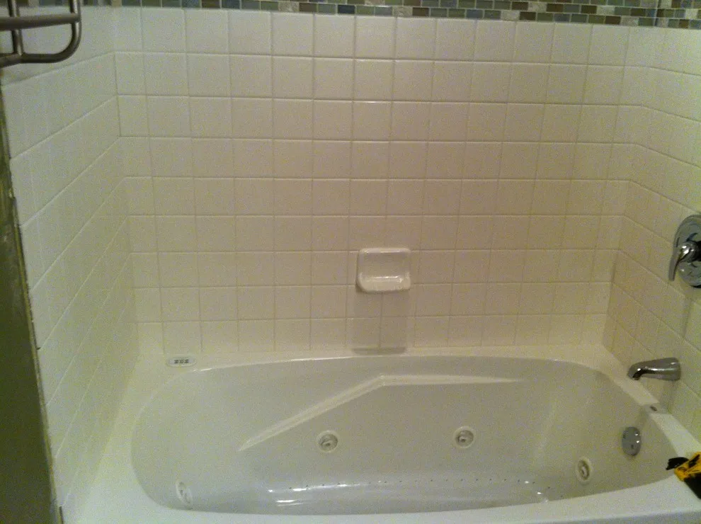 tiled border soaking bubble bath by Home Preservation Specialists Inc - Photo 2