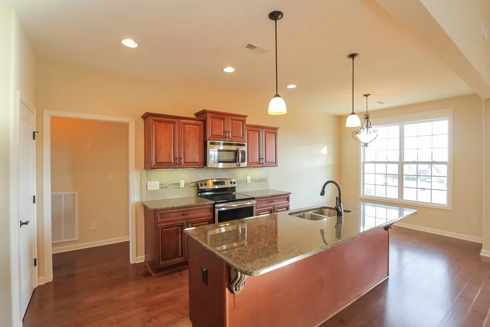 Ample Split-Level Home in Farmington Subdivision by Crabbe Homes - Photo 4
