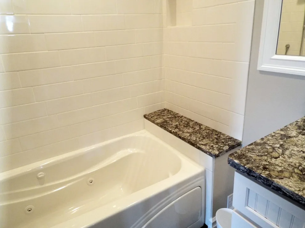 Brilliant White Bathroom by Gesang Remodeling - Photo 12