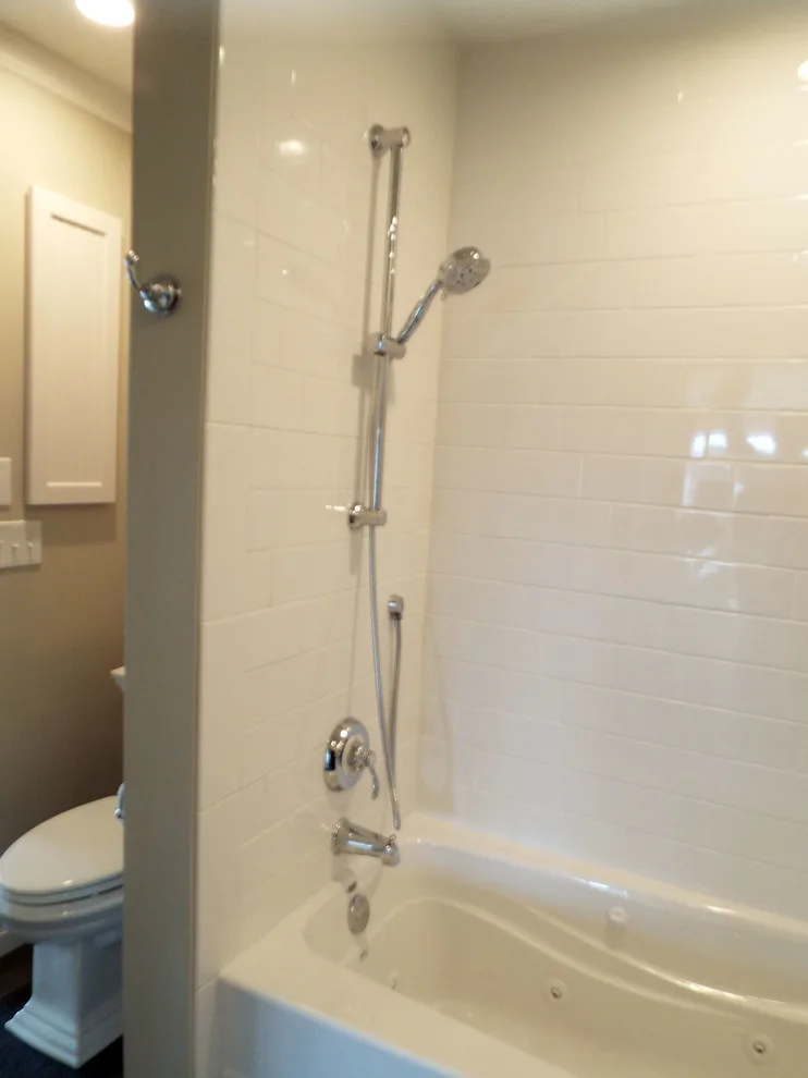 Brilliant White Bathroom by Gesang Remodeling - Photo 10