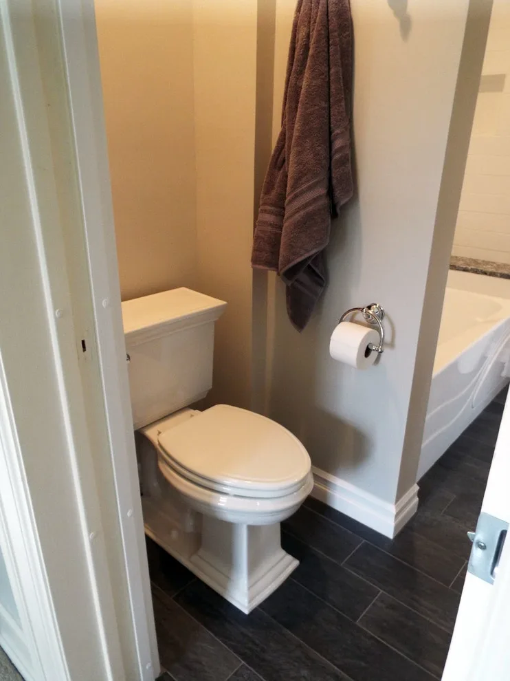 Brilliant White Bathroom by Gesang Remodeling - Photo 11