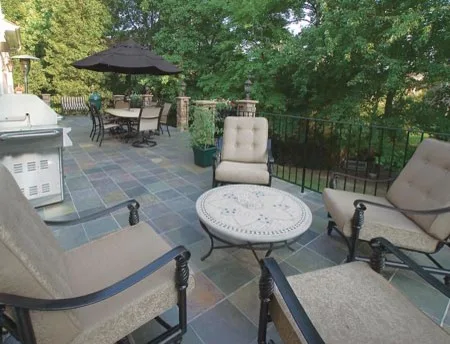 Stucco and Slate Deck and Porch by Lone Star Construction - Photo 4