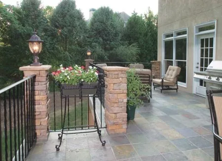 Stucco and Slate Deck and Porch by Lone Star Construction - Photo 7