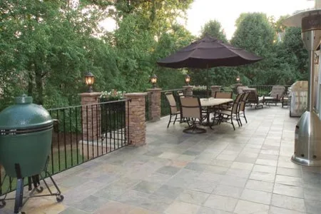 Stucco and Slate Deck and Porch by Lone Star Construction - Photo 2