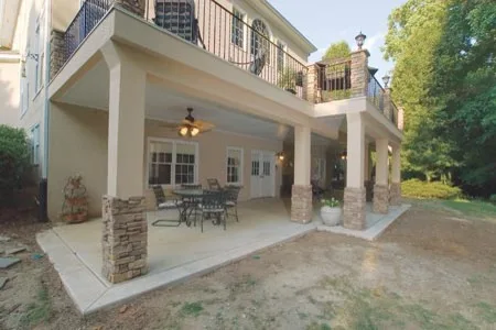 Stucco and Slate Deck and Porch by Lone Star Construction - Photo 3