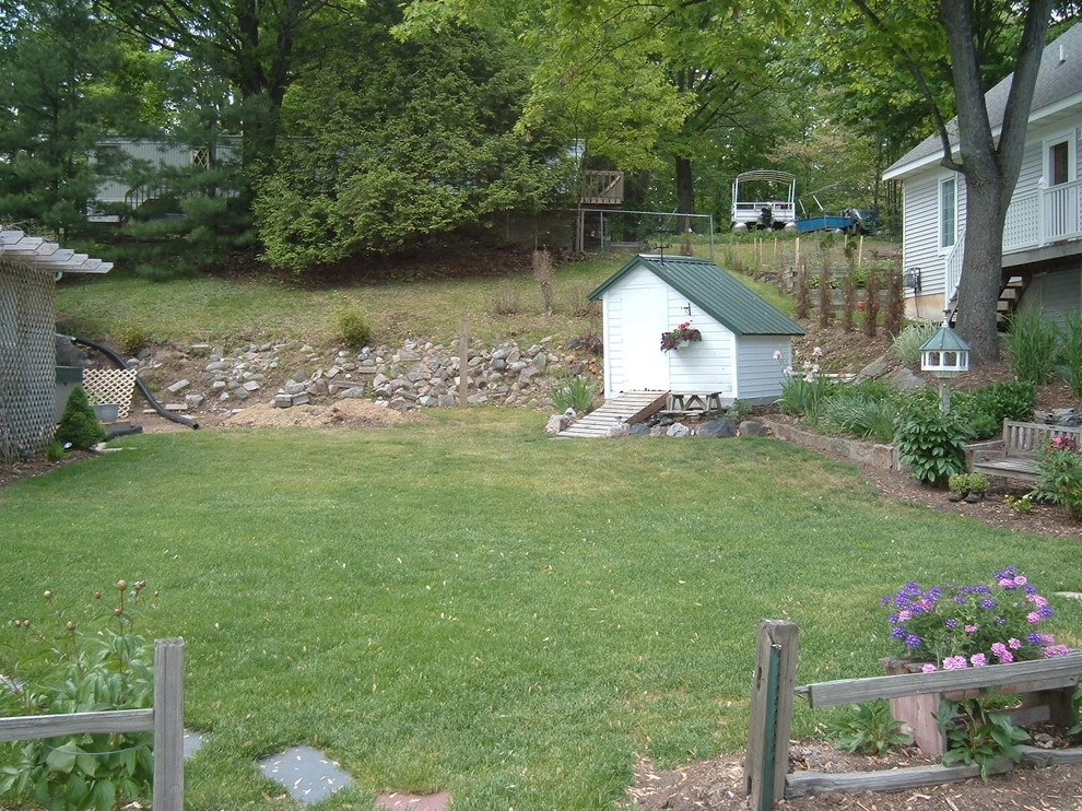 Backyard Patio with Multi-tier Retaining Wall by Majestic Services Of Michigan - Photo 3
