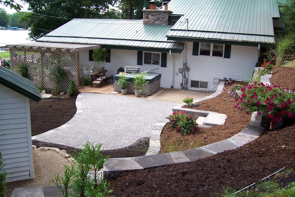 Backyard Patio with Multi-tier Retaining Wall by Majestic Services Of Michigan - Photo 2