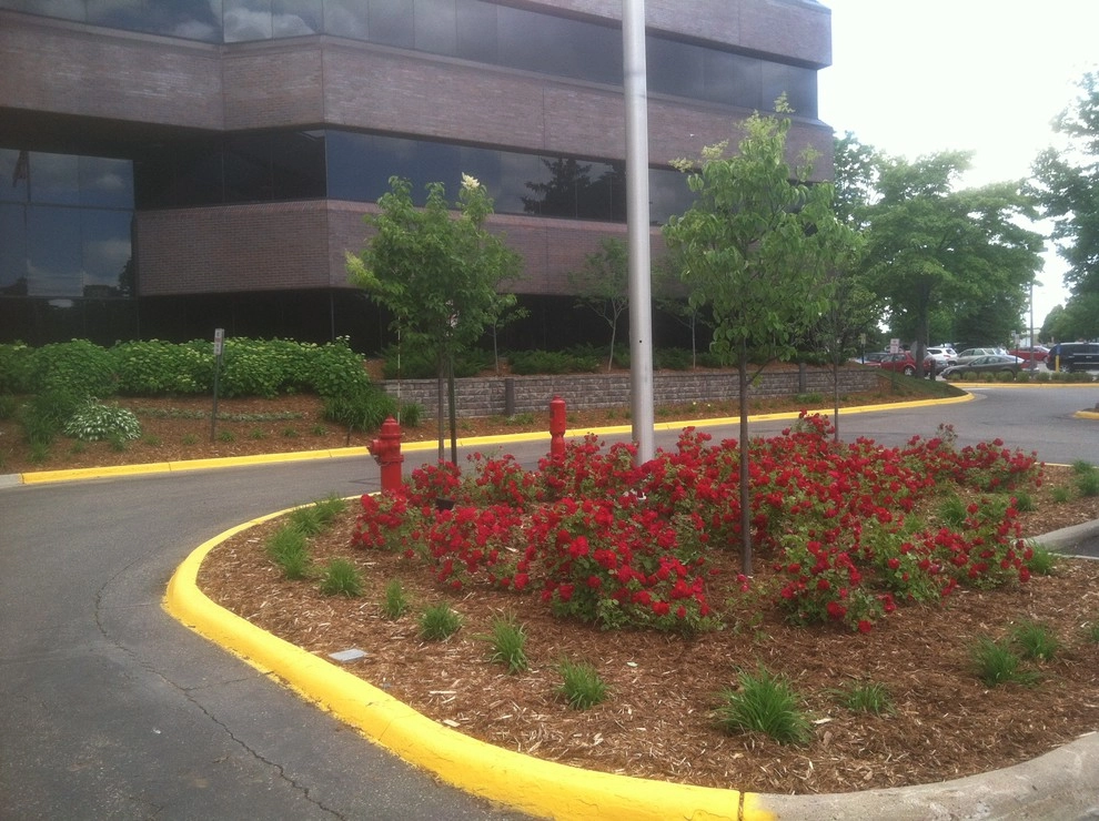 Retaining Wall & Landscape Design by Mark's Lawn Service, Inc. - Photo 4