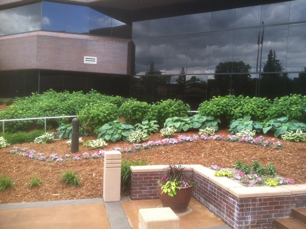 Retaining Wall & Landscape Design by Mark's Lawn Service, Inc. - Photo 2