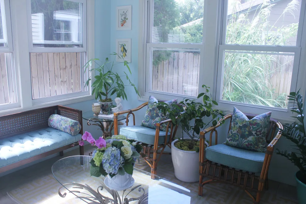 Vibrant Riverside Sunroom by Megan McGraw Interior Design - Photo 4