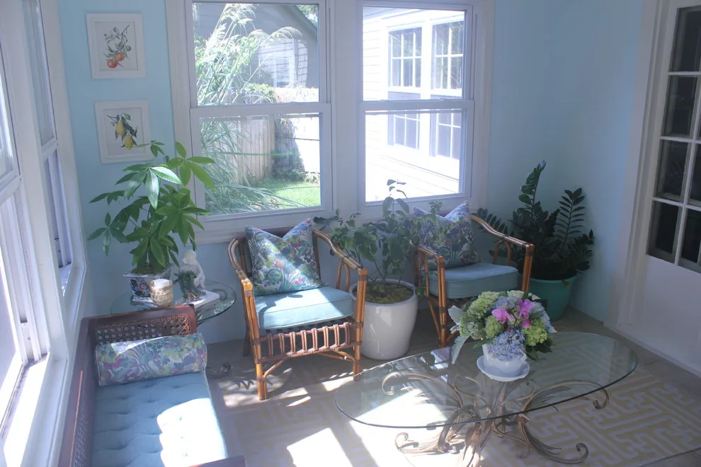Vibrant Riverside Sunroom by Megan McGraw Interior Design - Photo 2