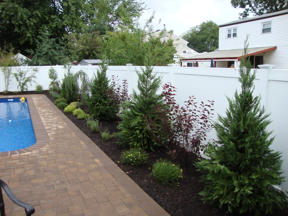 Landscape Design by Longo's Landscaping & Masonry - Photo 11