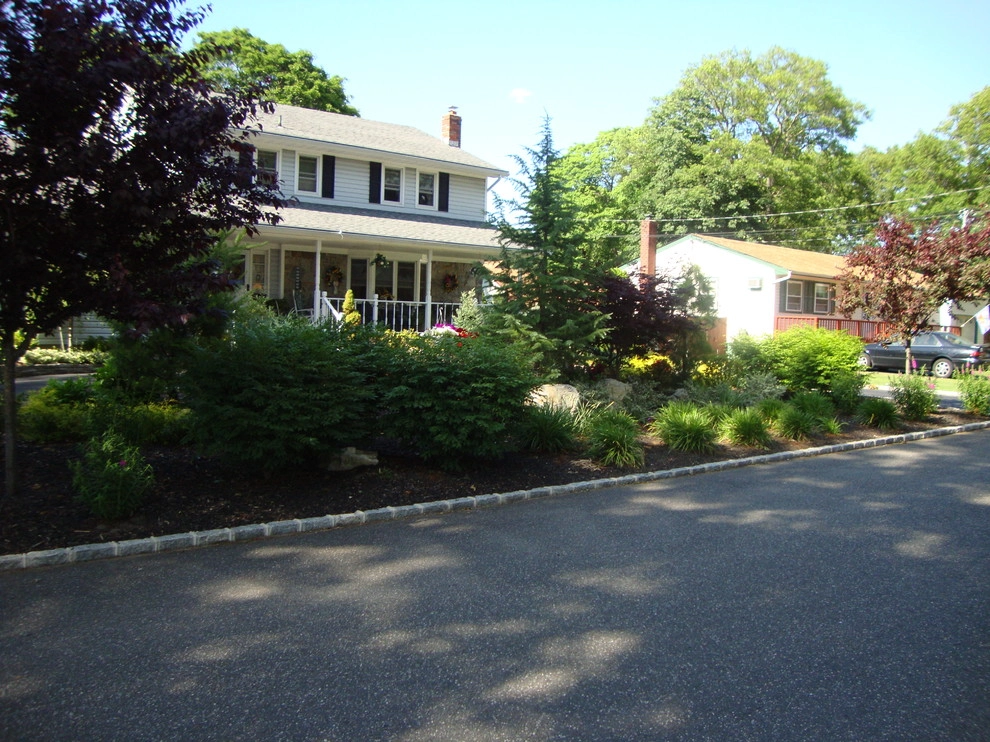 Landscape Design by Longo's Landscaping & Masonry - Photo 18