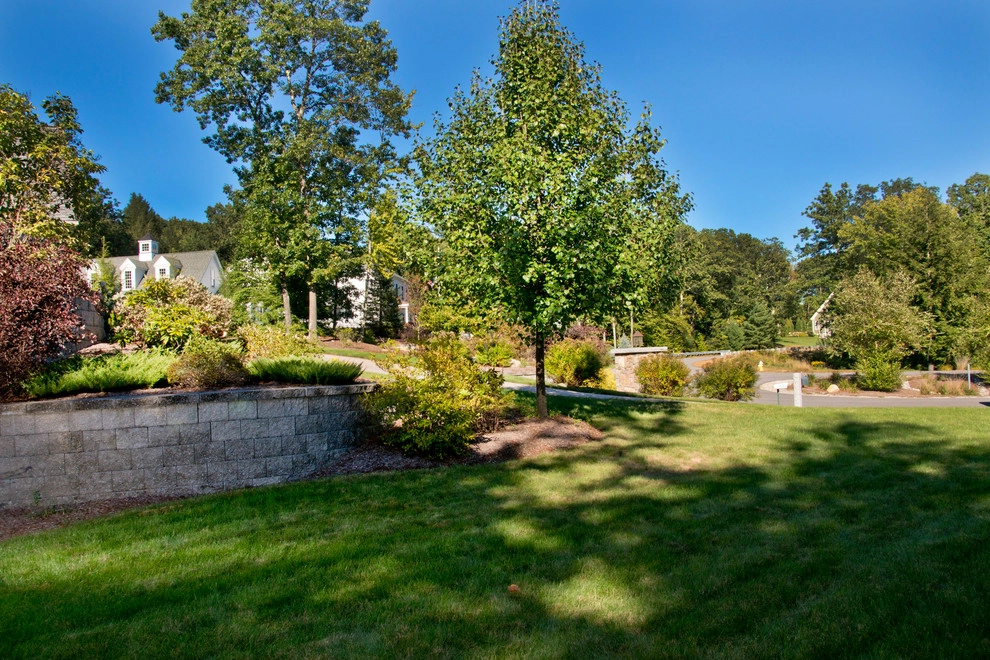 Comprehensive Landscaping with Patio, Retaining Wall, Fire Pit by Michael Therrien Landscaping, LLC - Photo 14