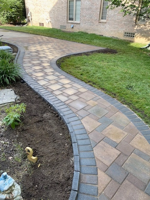 Diamond Design & Curved Walkway by Mike's Clean Cut Landscaping, Inc - Photo 2
