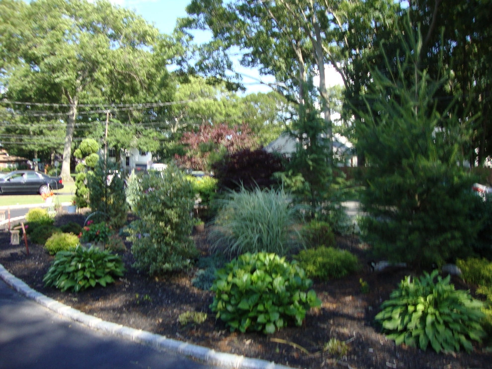 Landscape Design by Longo's Landscaping & Masonry - Photo 15