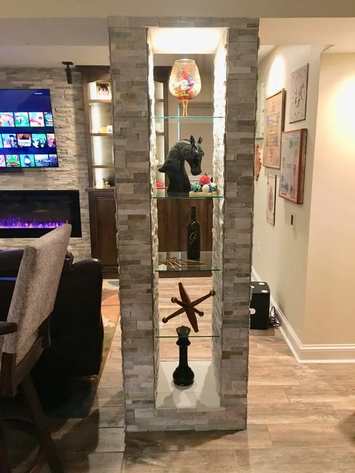 Basement with a Gaming Theme by Surface To Surface Interior Design/Construction - Photo 9