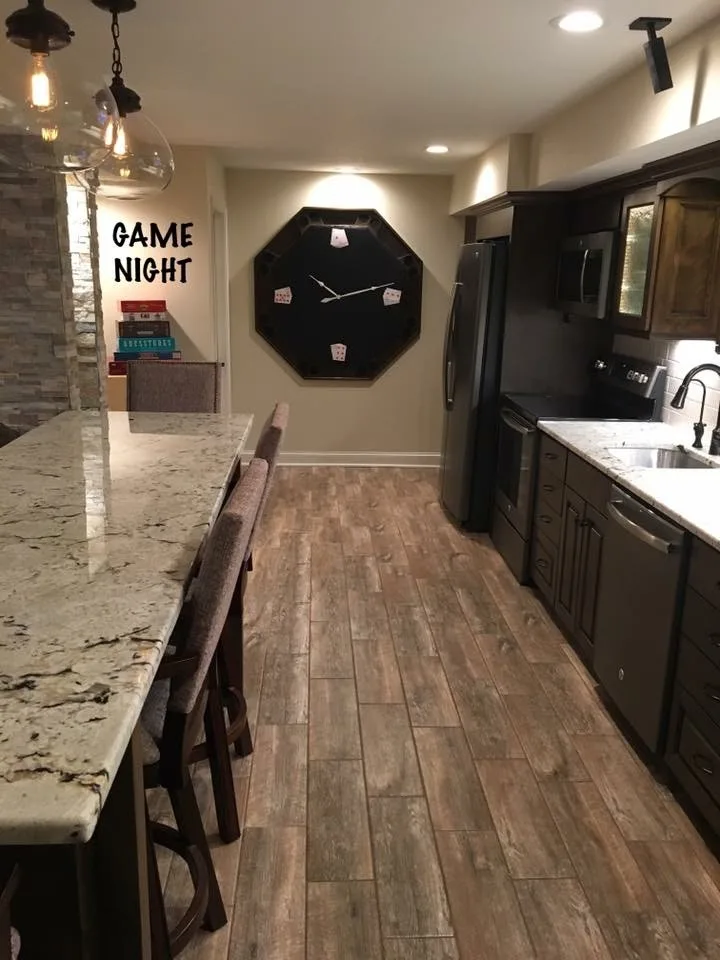 Basement with a Gaming Theme by Surface To Surface Interior Design/Construction - Photo 2