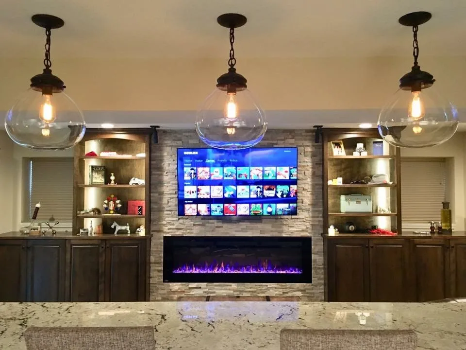 Basement with a Gaming Theme by Surface To Surface Interior Design/Construction - Photo 7