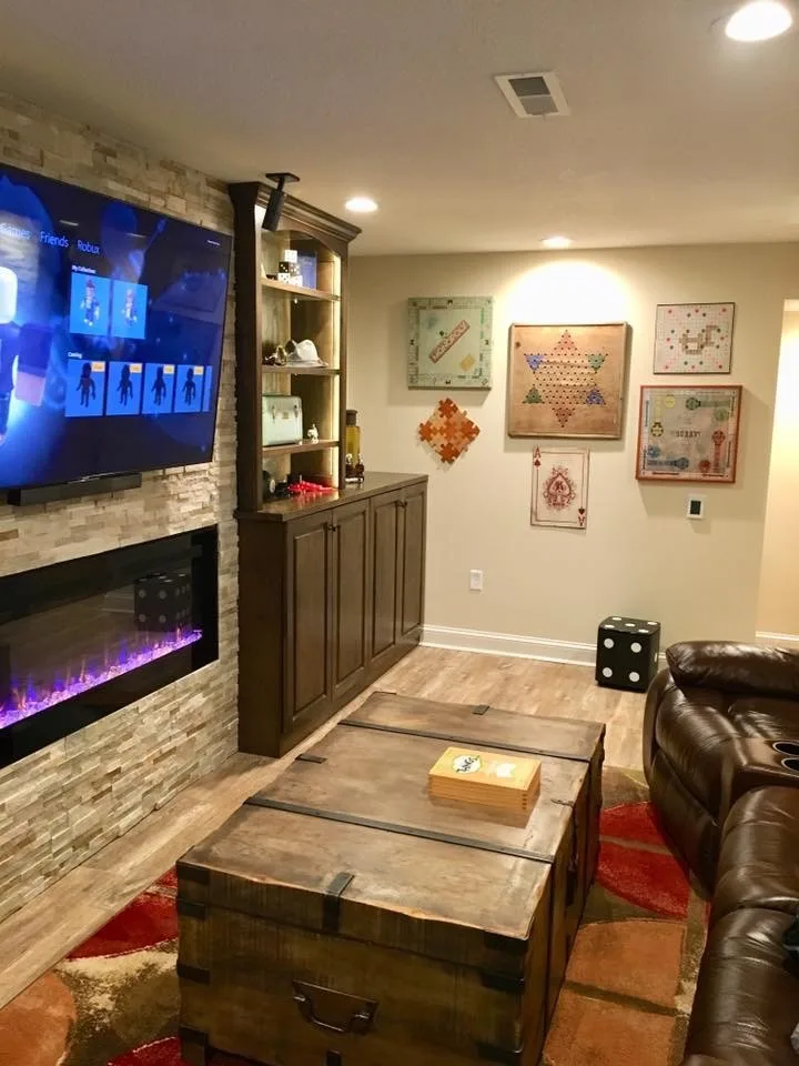 Basement with a Gaming Theme by Surface To Surface Interior Design/Construction - Photo 10