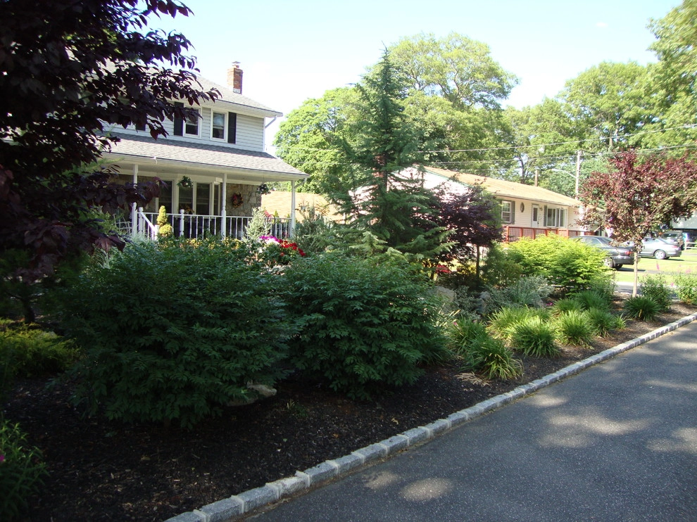 Landscape Design by Longo's Landscaping & Masonry - Photo 16