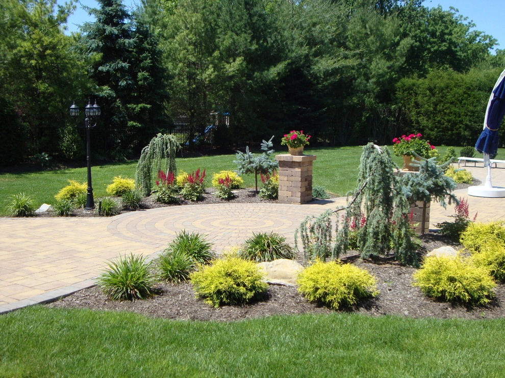 Landscape Design by Longo's Landscaping & Masonry - Photo 12