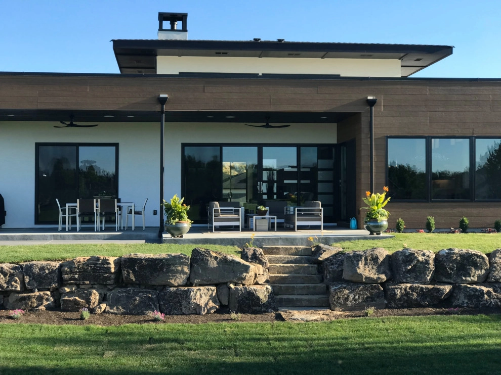 Asin residence boulder retaining wall with natural stone steps by Modern Landscape - Photo 5