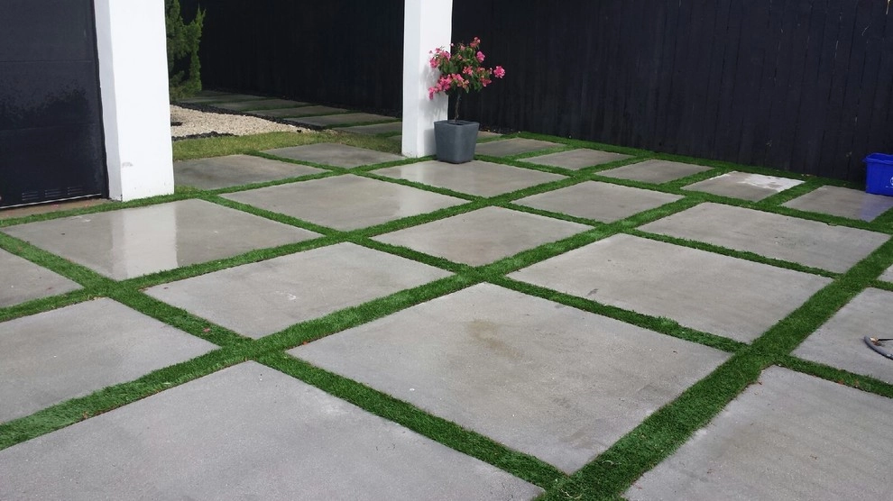 Concrete Pads by Monster Grass Artificial Turf & Ivy - Photo 13